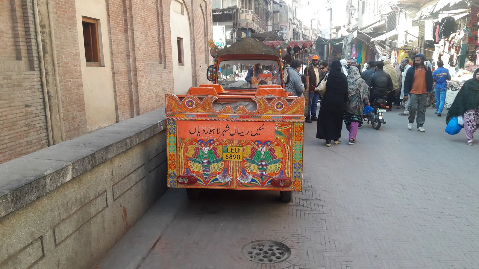 A decorated auto rickshaw in the inner city of Lahore