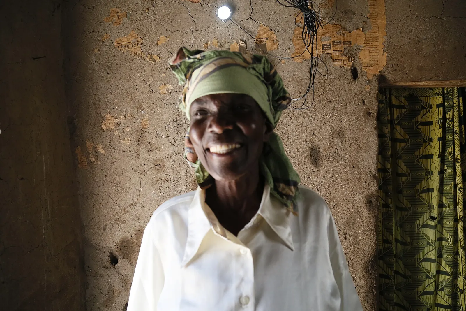 Elizabeth Mukwimba of Tanzania, whose home now has solar lighting and power