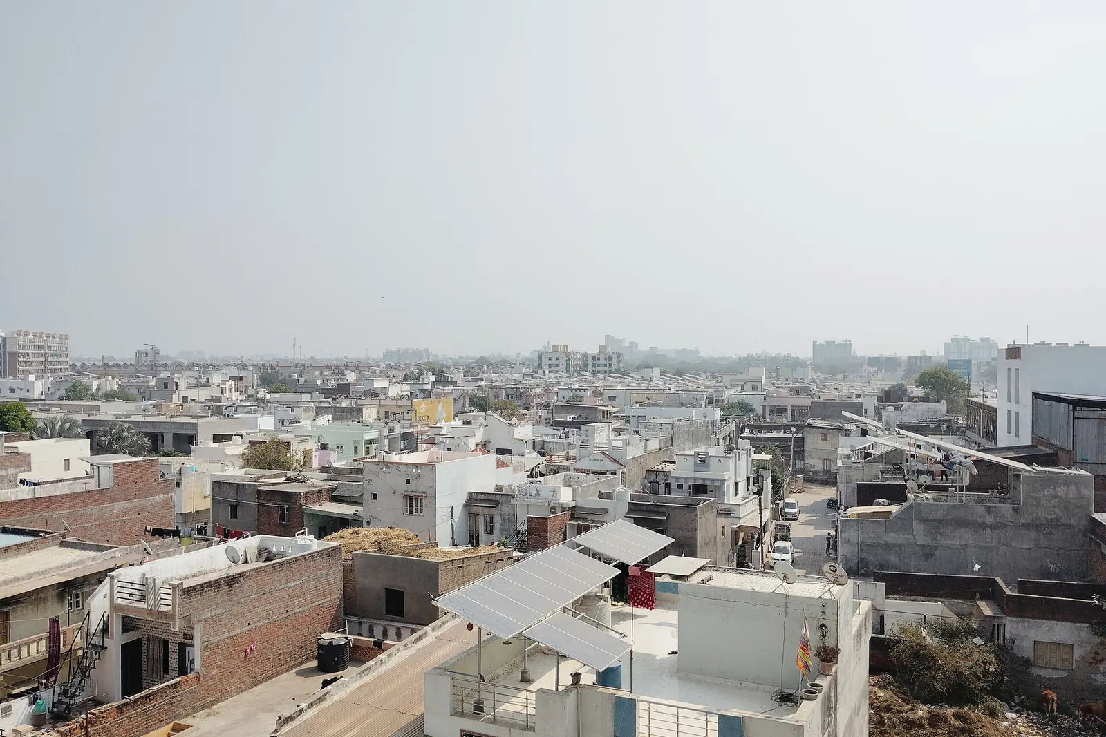 Rooftop solar panels on homes in Mehsana, Gujarat, India